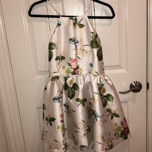 Formal floral low back skater dress.